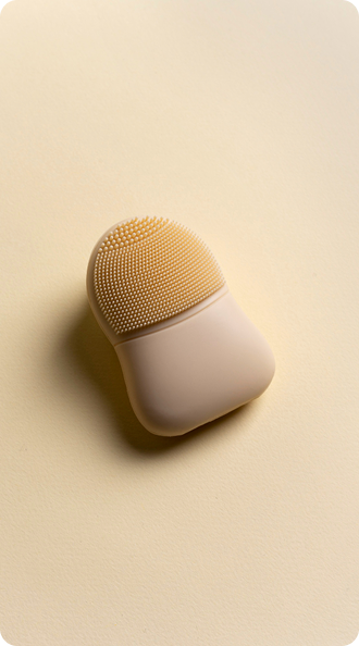 Cleanroom operator working with industrial manufacturing machine