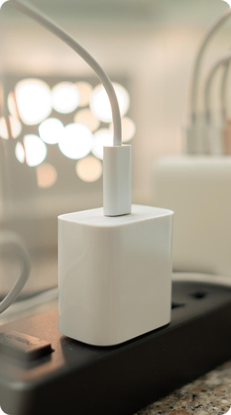 Cleanroom operator working with industrial manufacturing machine