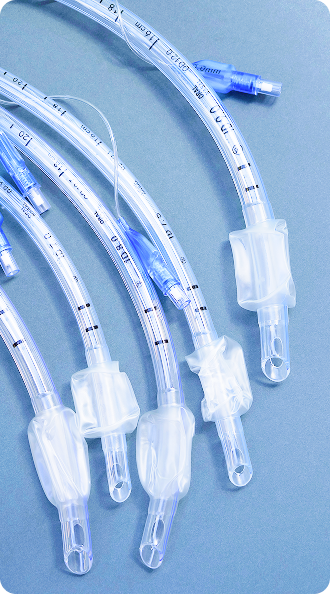 Cleanroom operator working with industrial manufacturing machine