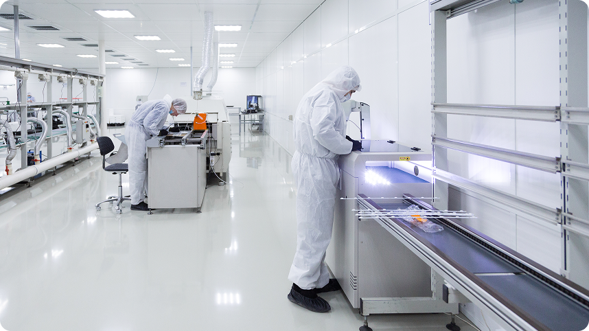 White silicone tubes hanging for quality inspection in cleanroom