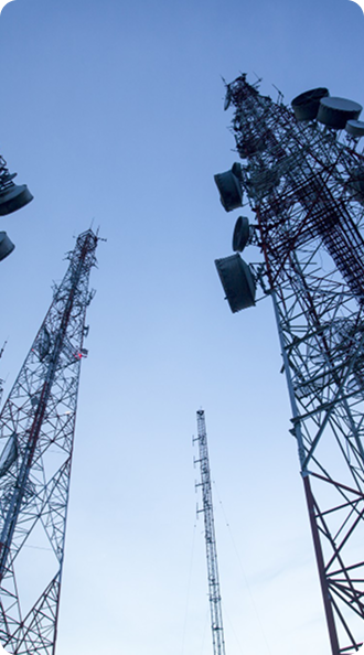 Cleanroom operator working with industrial manufacturing machine