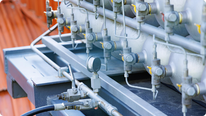 Cleanroom operator interacting with machine control panel